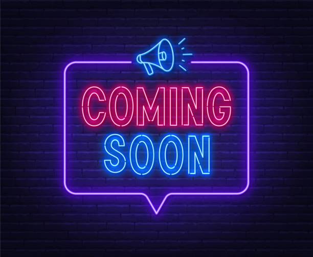 Coming soon neon sign in speech bubble frame with megaphone .